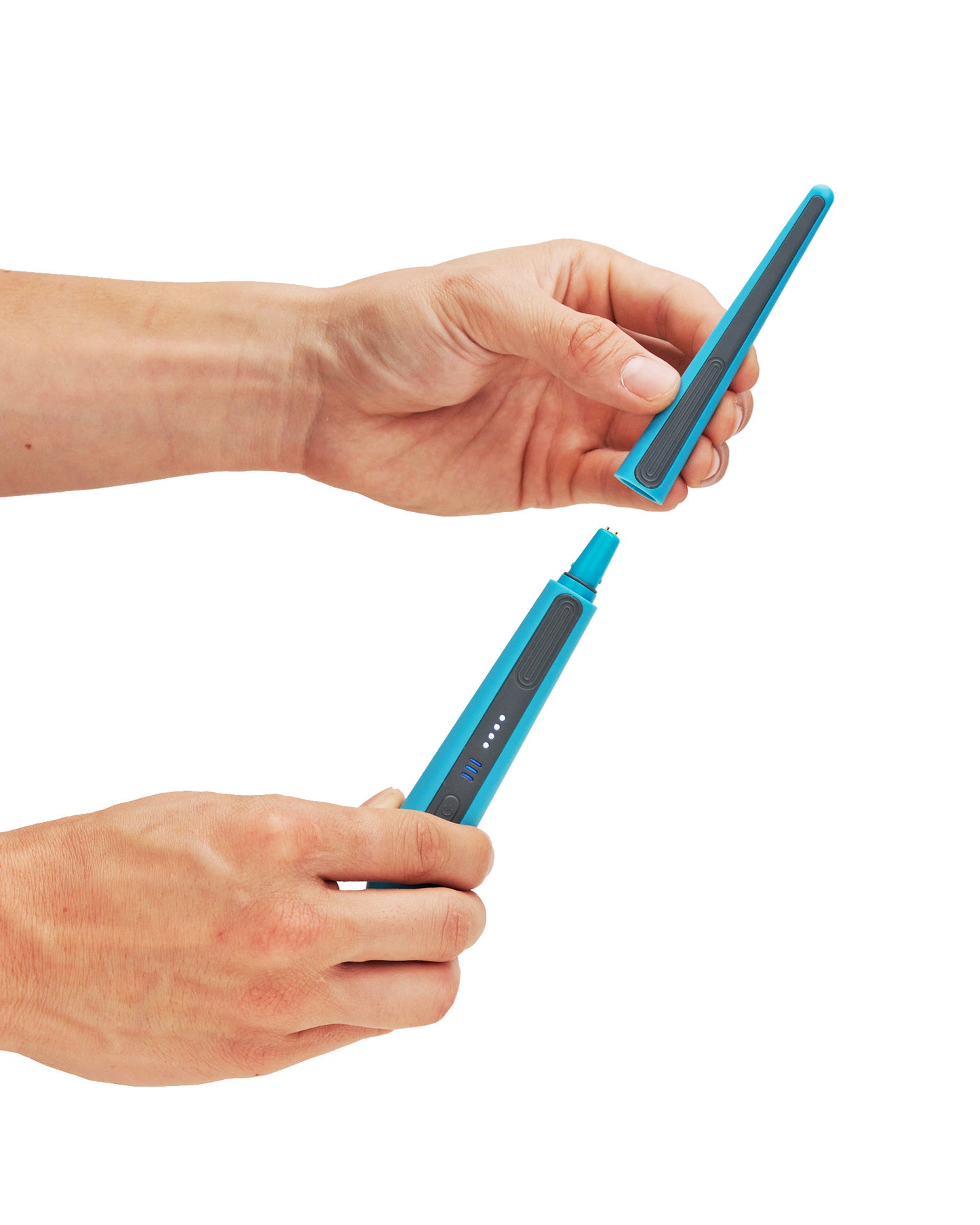A replacement brush head for the Oreze toothbrush in marine blue, demonstrated by a model's hands