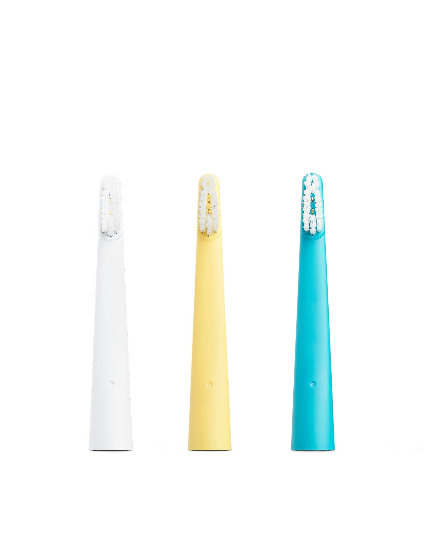 Three replacement brush heads next to each other in all three colors